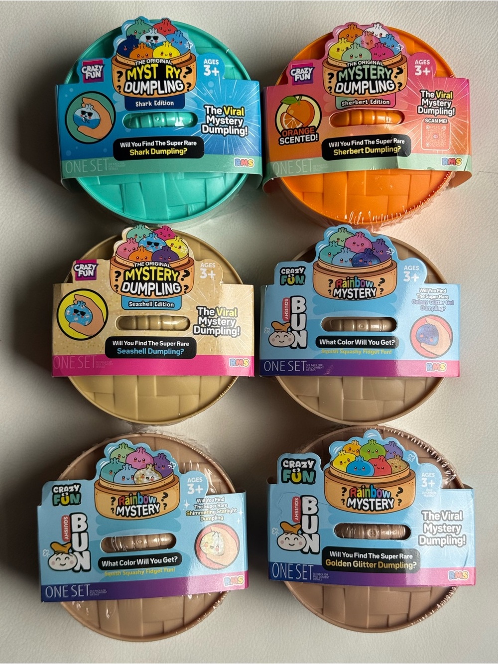 NEW RARE ORANGE Shark Seashell Glitter Galaxy Dumpling Squishy Set Crazy Fun RMS